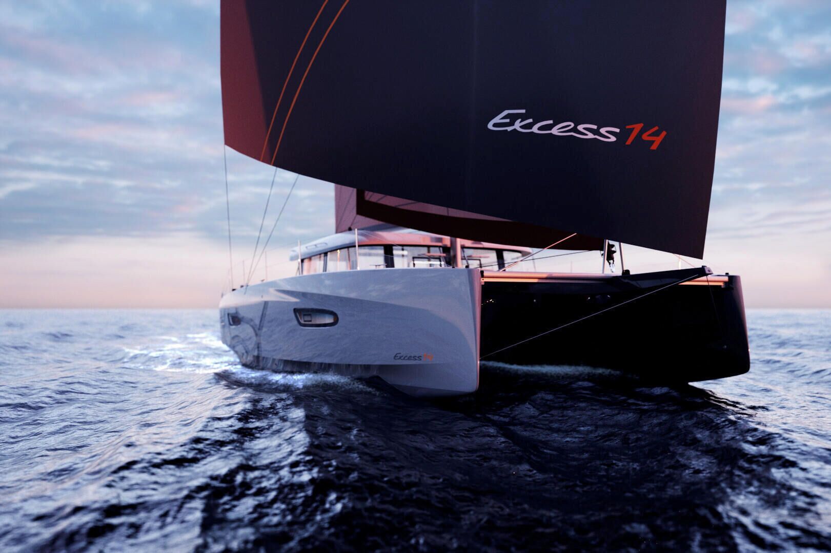 A sailboat named 'Excess 14' on the water.