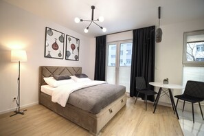 Apartamento superior, balcón, vistas a la ciudad | Wifi gratis