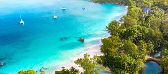 Seychelles Sun-Soaked Sailing: A Pristine Beach Experience from Praslin