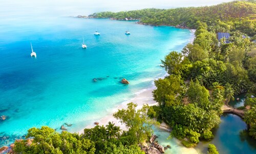 Seychelles Sun-Soaked Sailing: A Pristine Beach Experience from Praslin