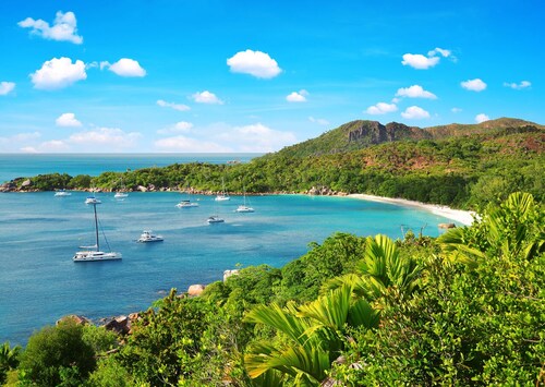 Seychelles Sun-Soaked Sailing: A Pristine Beach Experience from Praslin