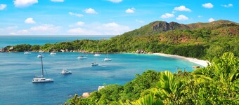 Seychelles Sun-Soaked Sailing: A Pristine Beach Experience from Praslin