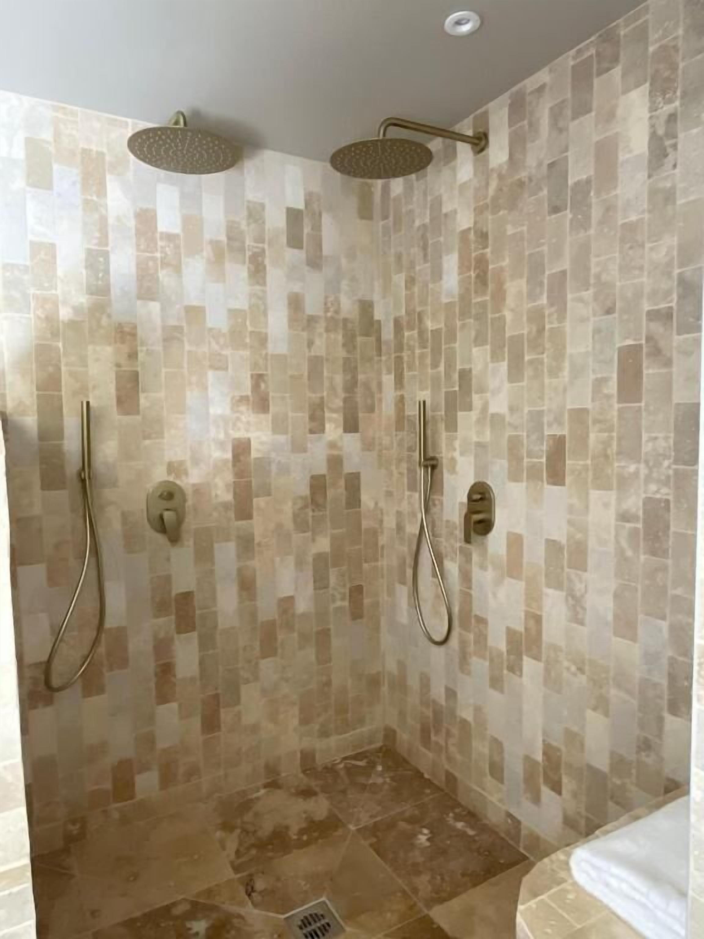 Deluxe suite, uitzicht op tuin | Badkamer