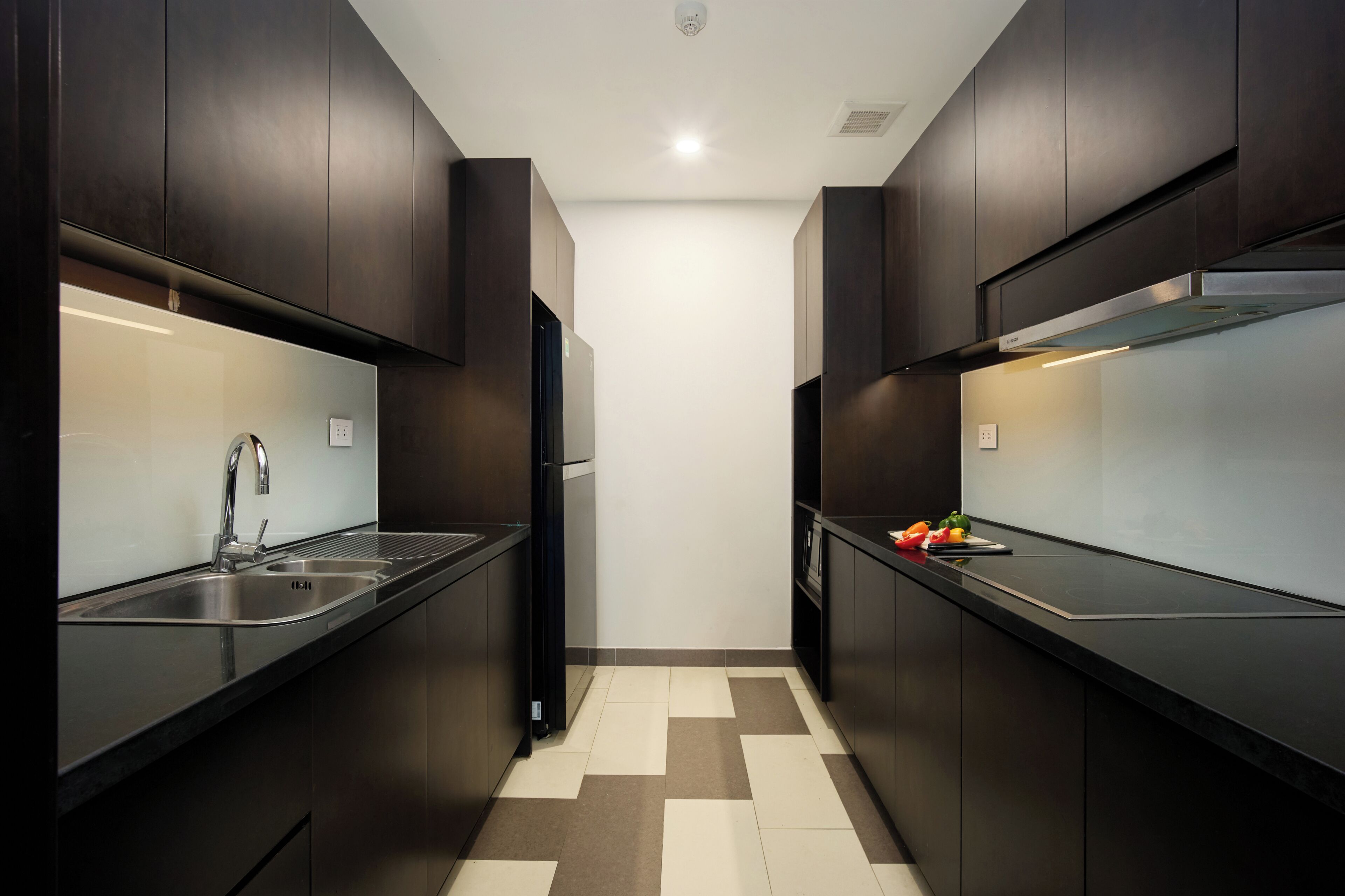 Full-sized fridge, microwave, stovetop, cookware/dishes/utensils