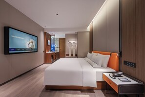 เครื่องนอนระดับพรีเมียม, ผ้านวมขนเป็ด, มินิบาร์ฟรี, เตารีด/โต๊ะรีดผ้า