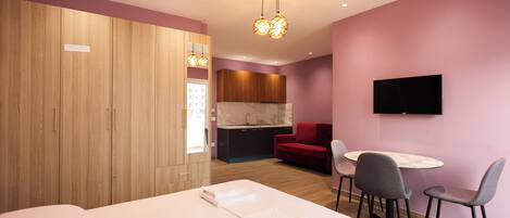 Deluxe Double Room, City View | Desk, laptop workspace, WiFi (free), bed sheets
