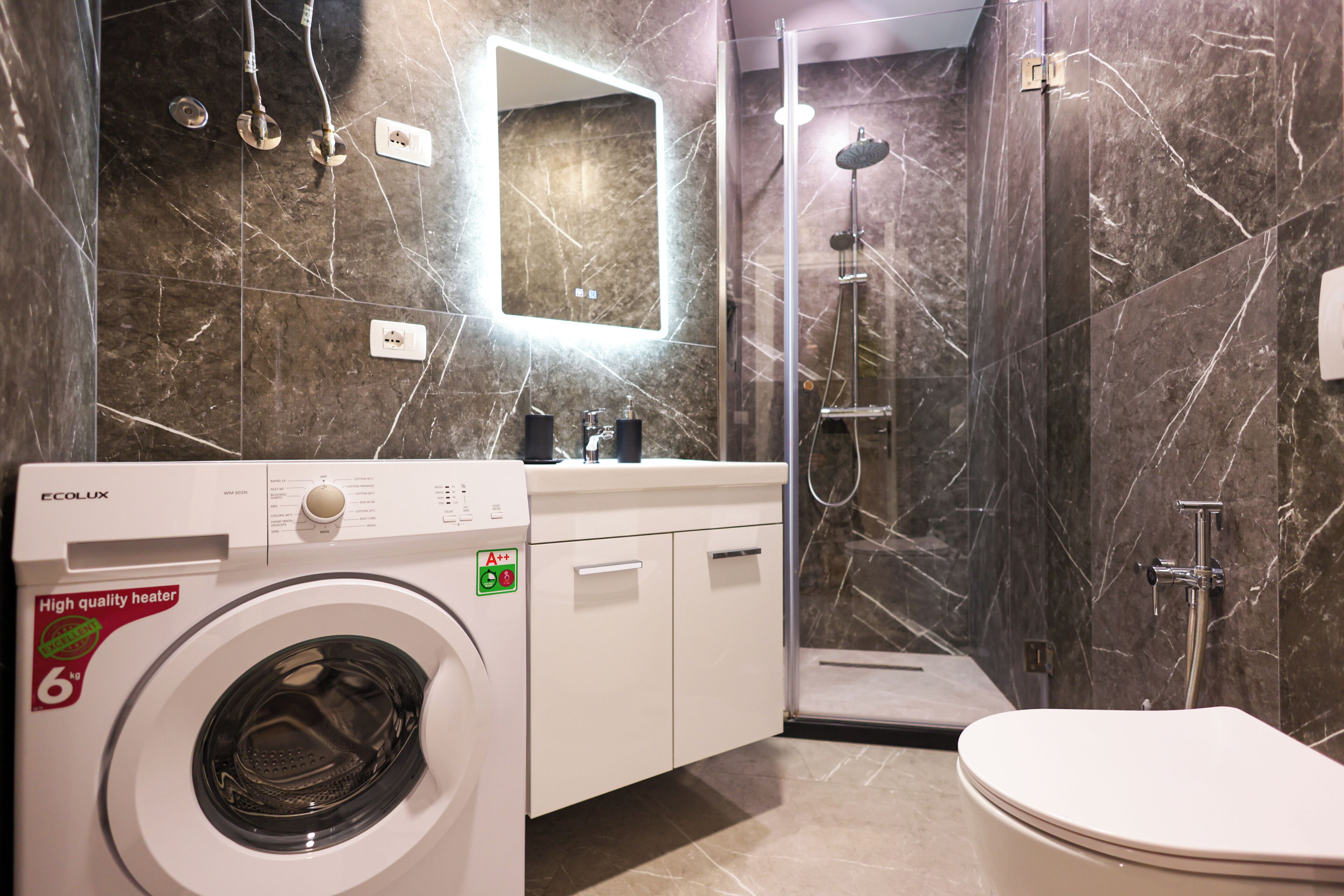 Grandstay Urban Nine | Bathroom | Shower, hair dryer, towels, toilet paper