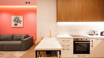 Leilighet, byutsikt | Eget kjøkken | Kjøleskap, mikrobølgeovn, ovn og kokeplater