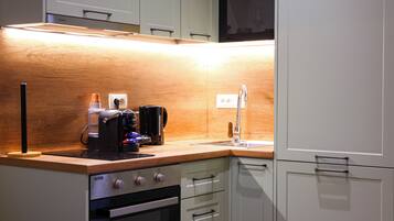 Grandstay Urban Nine | Private kitchen | Full-size fridge, microwave, oven, stovetop