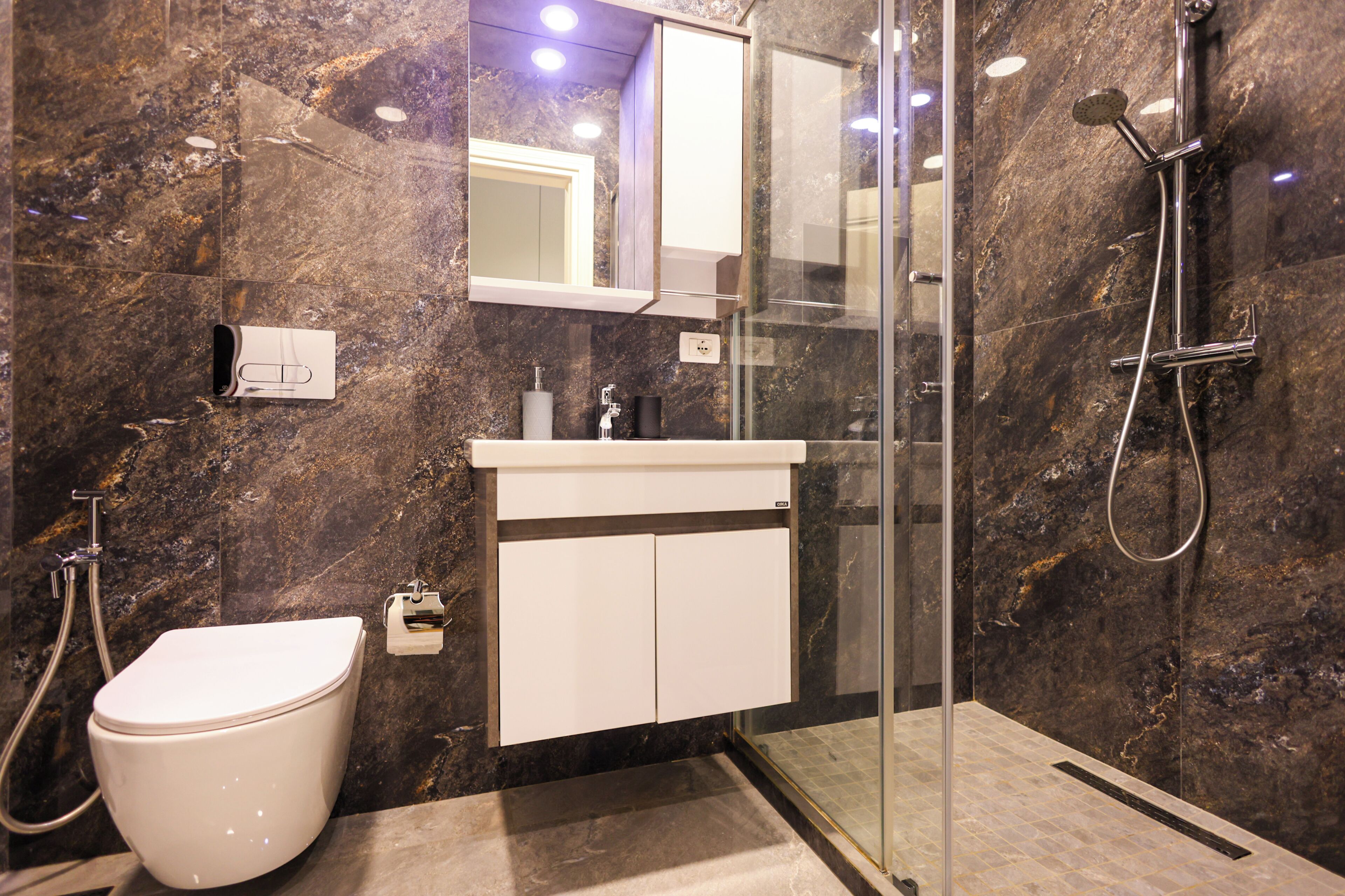 Grandstay Urban Eight | Bathroom | Shower, hair dryer, towels, toilet paper