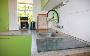 Casa | Cozinha privada | Cadeirão de bebê