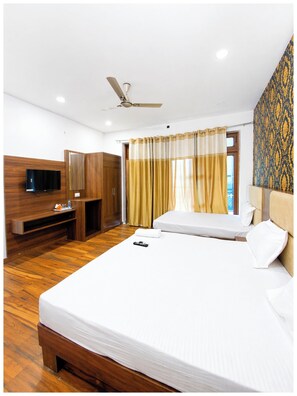 Chambre Triple Deluxe, climatisation | Vue de la chambre