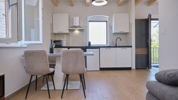 Apartment, 1 Bedroom, Balcony | Private kitchen | Microwave, oven, stovetop, dishwasher