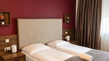 Desk, blackout drapes, iron/ironing board, free WiFi
