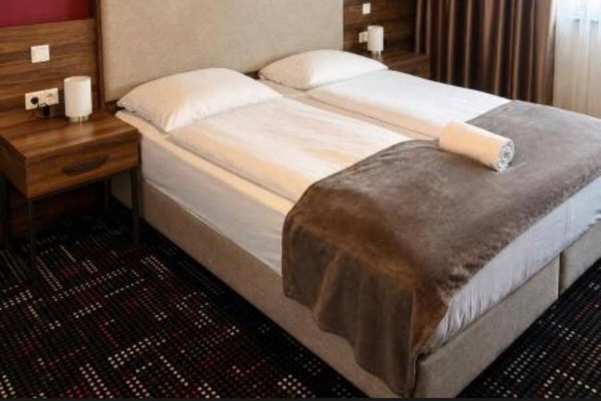Desk, blackout curtains, iron/ironing board (on request), free WiFi