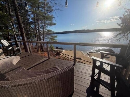 Long Lake cottage with spacious screened porch and excellent sunset views!