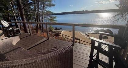 Long Lake cottage with spacious screened porch and excellent sunset views!