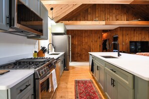 Fridge, microwave, oven, stovetop - Long Lake cottage with spacious screened porch and excellent sunset views! (Harrison)