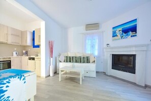 Honeymoon-Suite, Balkon, Meerblick | Wohnbereich