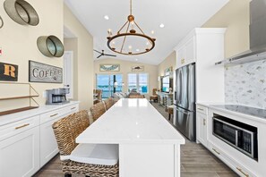 Fridge, microwave, oven, stovetop - Luxury Lagoon Front House w/ Elevator | Fire Pit | Boat Parking | Sleeps 10 (Gulf Shores)