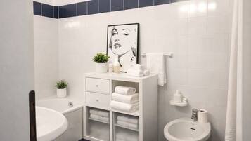 Shower, free toiletries, hair dryer, towels