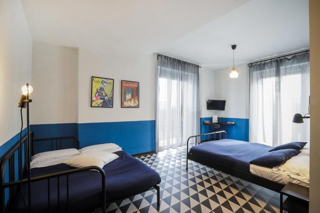 Quarto quádruplo, sacada, vista para a cidade