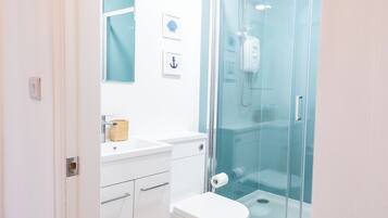 Shower, towels, soap, shampoo