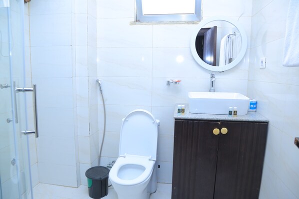 Twin Room, Balcony, City View | Bathroom - yellow apple hotel (Addis Ababa)