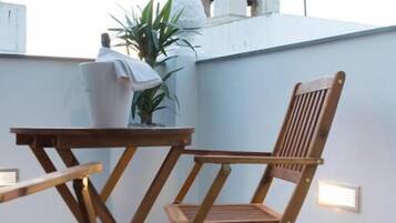 Deluxe Double Room, Patio, Partial Sea View | Outdoor dining
