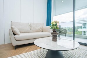 Classic Apartment, Balcony, Pool View | Living area - Coastal 1 bd apartment near the sea (Choeng Thale)