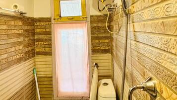 Shower, free toiletries, towels, soap