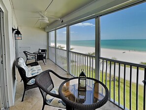 Outdoor dining - Pointe South 305 | Chic Coastal Getaway + Heated Pool (Fort Myers Beach)