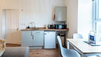 Fridge, microwave, electric kettle, toaster