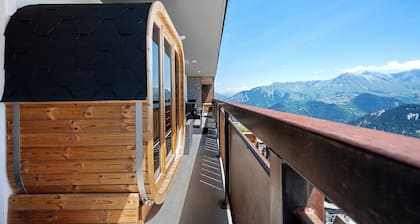 Appartement "Lodge Six De Savoie" avec vue sur les montagnes, terrasse privée et sauna