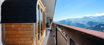 Apartment 'Lodge Six de Savoie' with Mountain View, Private Terrace and Sauna