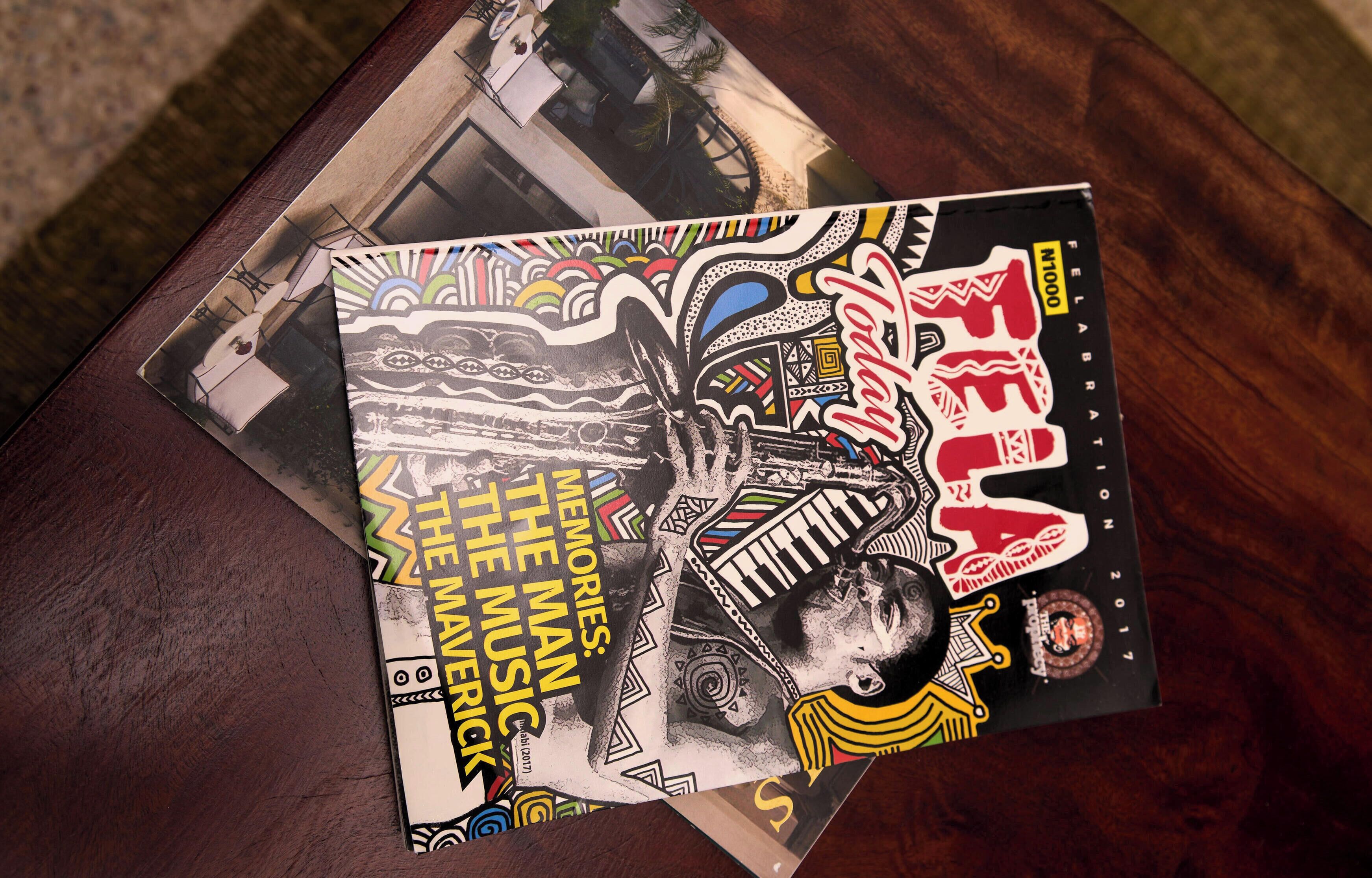 A magazine with a colorful cover on a wooden surface.