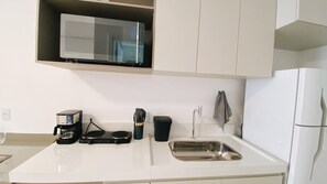 Fridge, microwave, cookware/dishes/utensils