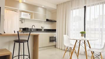 Microwave, oven, coffee/tea maker, cookware/dishes/utensils
