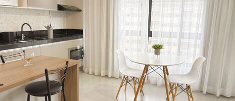 Microwave, oven, coffee/tea maker, cookware/dishes/utensils