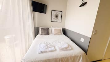 1 chambre, fer et planche à repasser, draps fournis