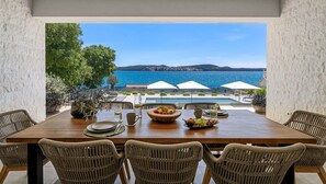 Outdoor dining - Beachfront Villa Luminara with 4 bedrooms, private pool, sauna (Seget Donji)