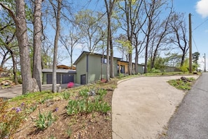 Wooded side yard and paved drive approach — private setting on a quiet street - Bike garage, game room, near downtown (Bentonville)