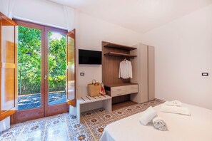 Departamento Deluxe, patio, vista al jardín | Wifi gratis 