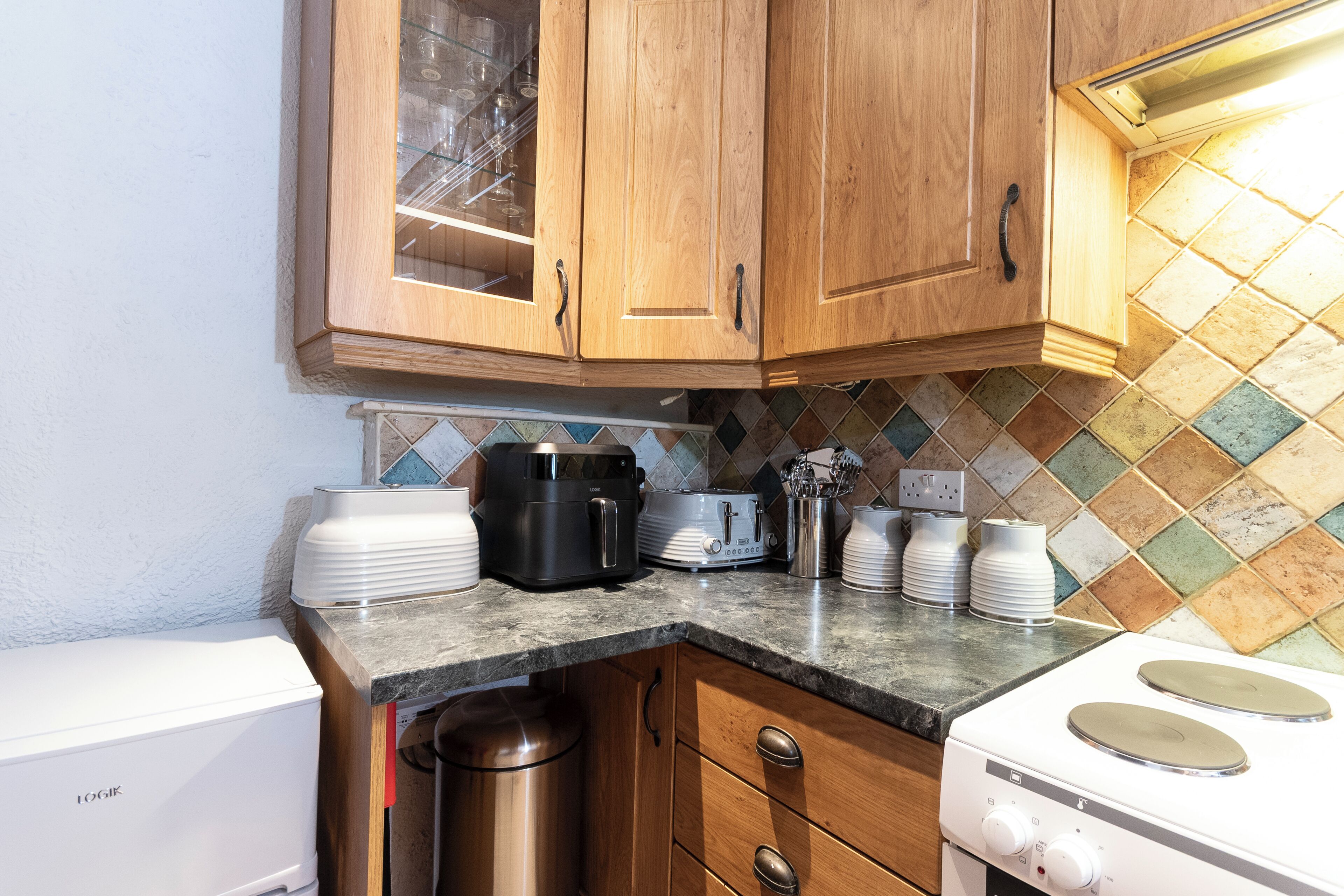 Fridge, microwave, electric kettle, toaster