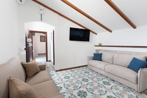 顶层房, 部分海景 | 起居区