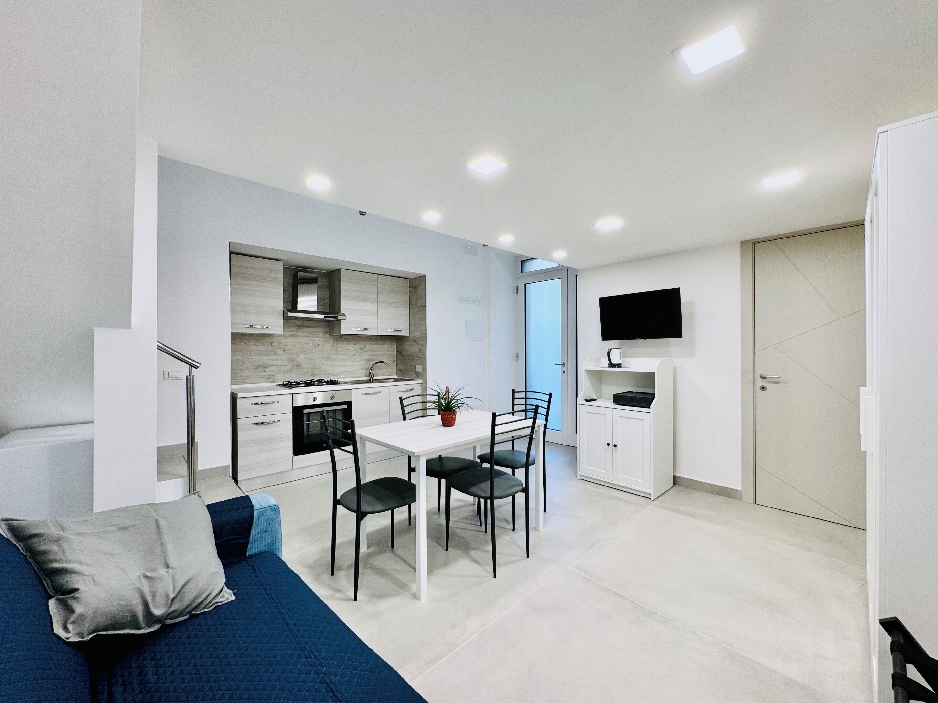 Appartement Duplex | Coin séjour | Télévision à écran plat de 32 pouces avec chaînes numériques