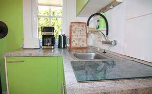 Casa | Cozinha privada | Cadeirão de bebê