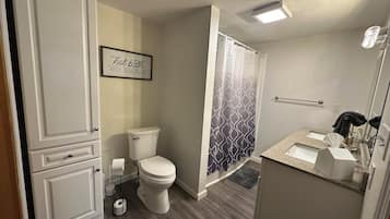 Hair dryer, towels, soap, toilet paper