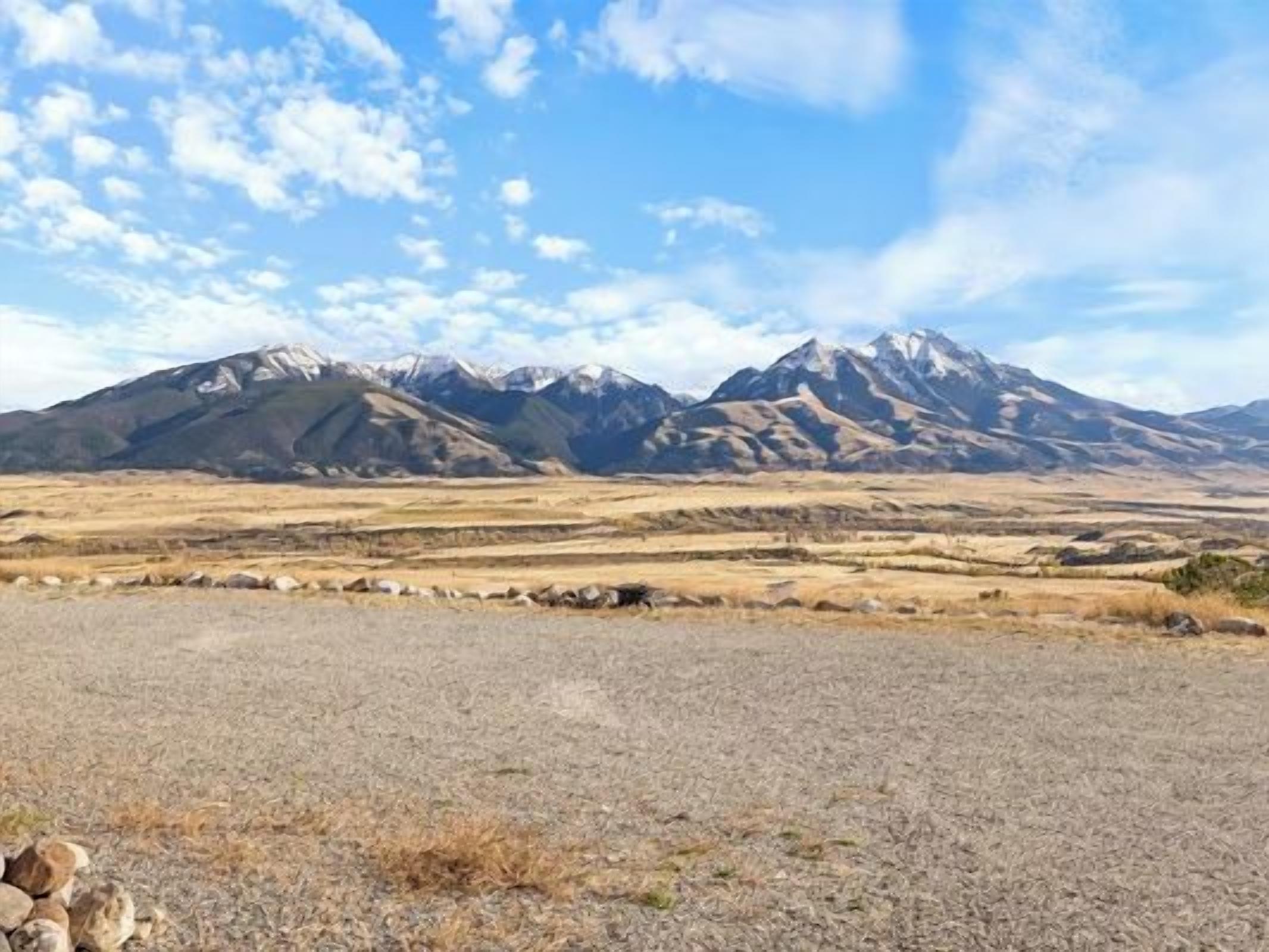 A mountainous landscape with a clear sky.