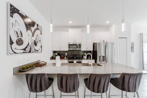 Fridge, microwave, oven, dishwasher - Storey Lake 5BR Townhome Near Disney (Kissimmee)